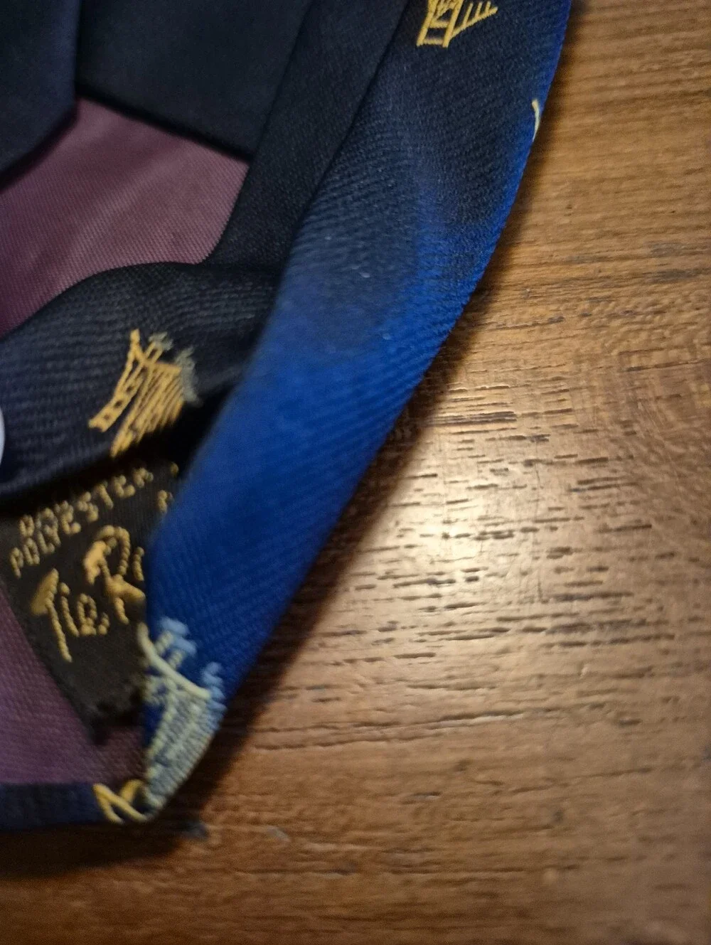 Vintage 69s Navy Tie with Gold Bridge Motif